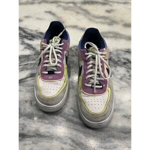 Nike Air Force 1 women’s size 10. (Fits like 9.5). White with colorful details.